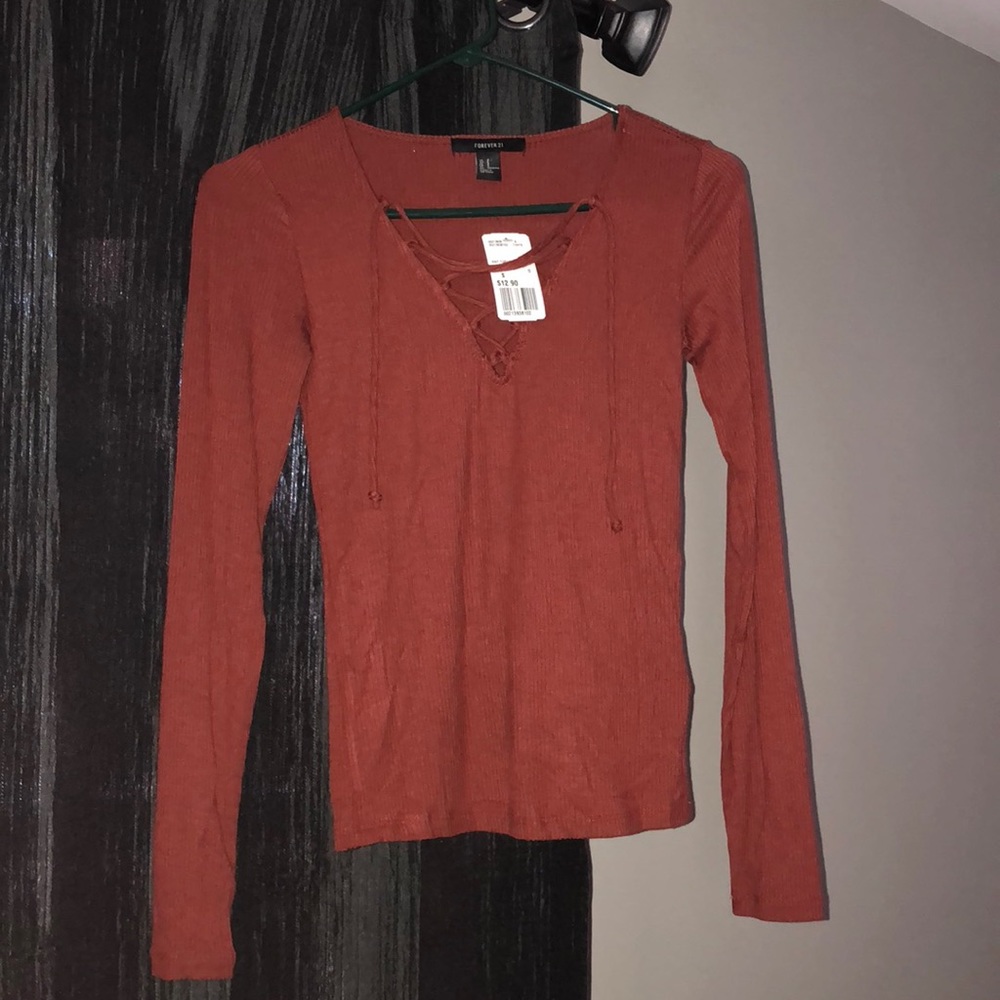 a red/brown shirt